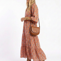 Geometric print V-neck tiered midi dress, orange with blue geometric pattern, side view