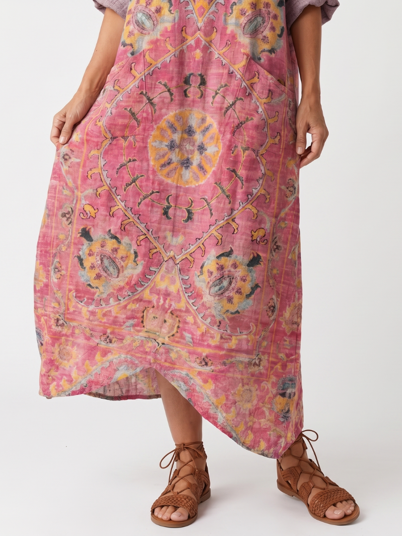 Pink abstract print midi dress with ornate medallion motifs, relaxed fit, pocket detail