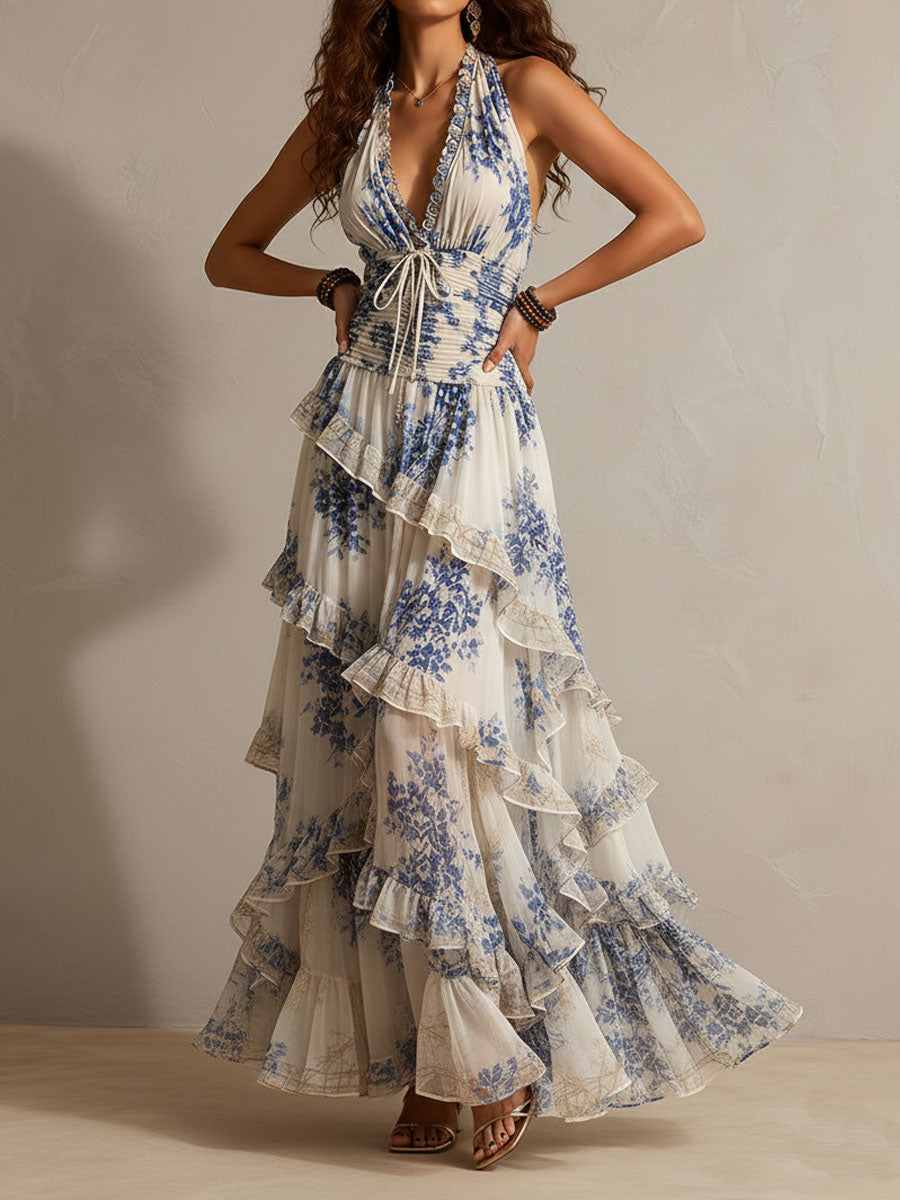 Blue and white floral halter ruffle maxi dress with tie-front waist and tiered ruffles