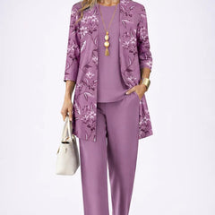 Purple three-piece trouser set with floral-pattern jacket and matching top and trousers