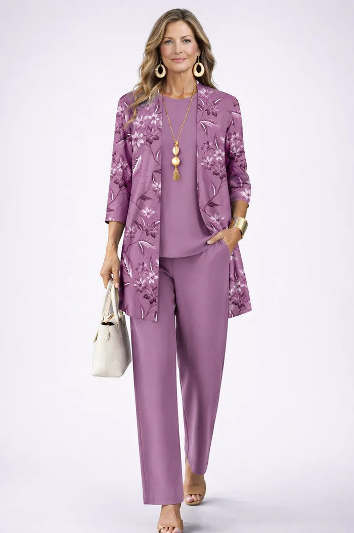 Purple three-piece trouser set with floral-pattern jacket and matching top and trousers
