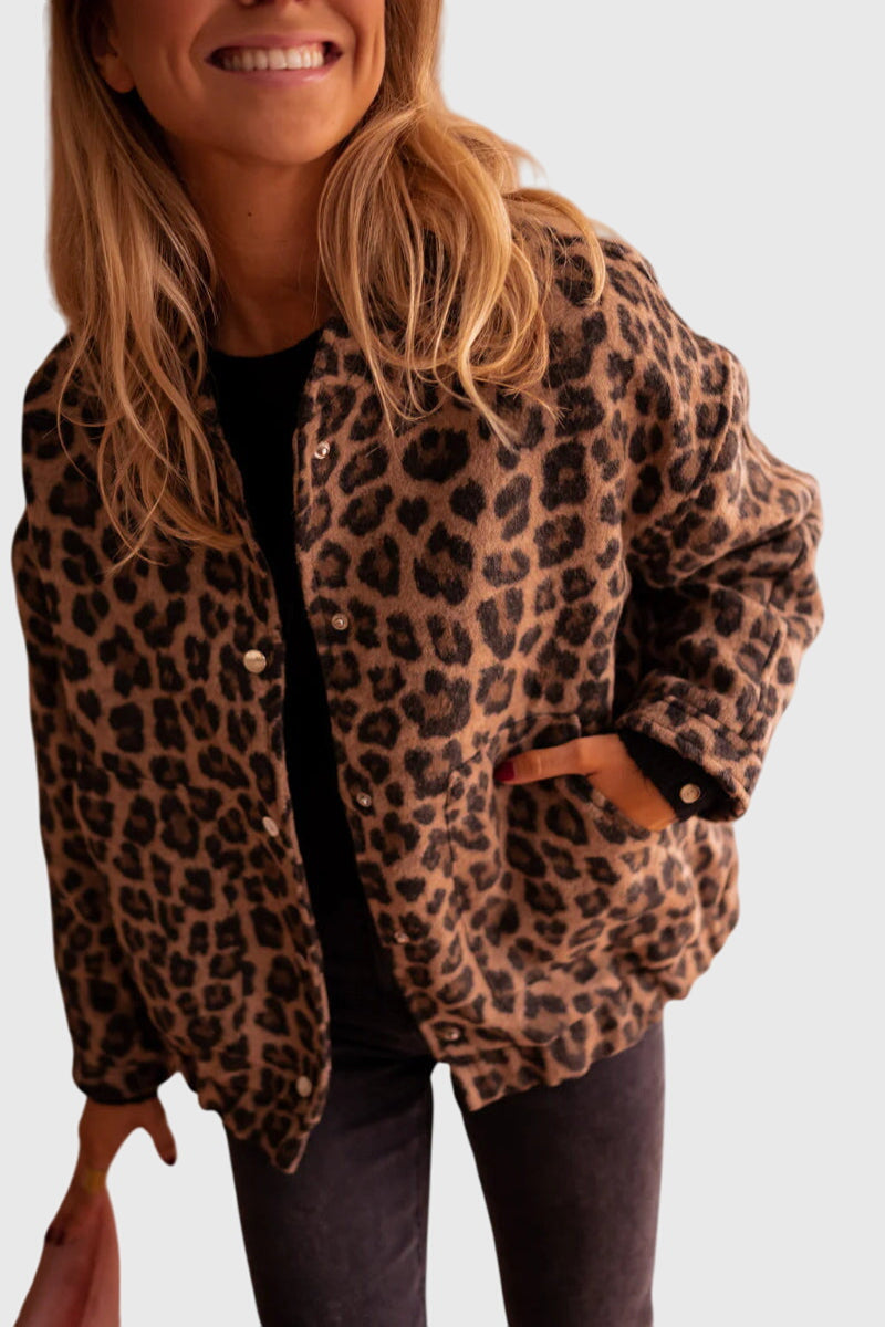 Leopard print jacket with button front and front pockets, long sleeves