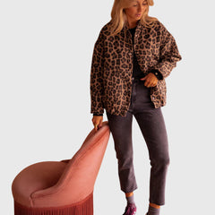 Leopard print jacket with button front, long sleeves, and front pockets