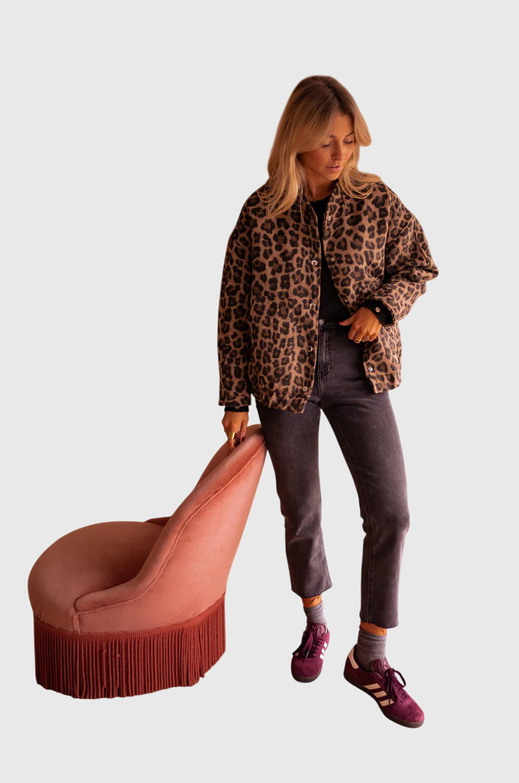 Leopard print jacket with button front, long sleeves, and front pockets