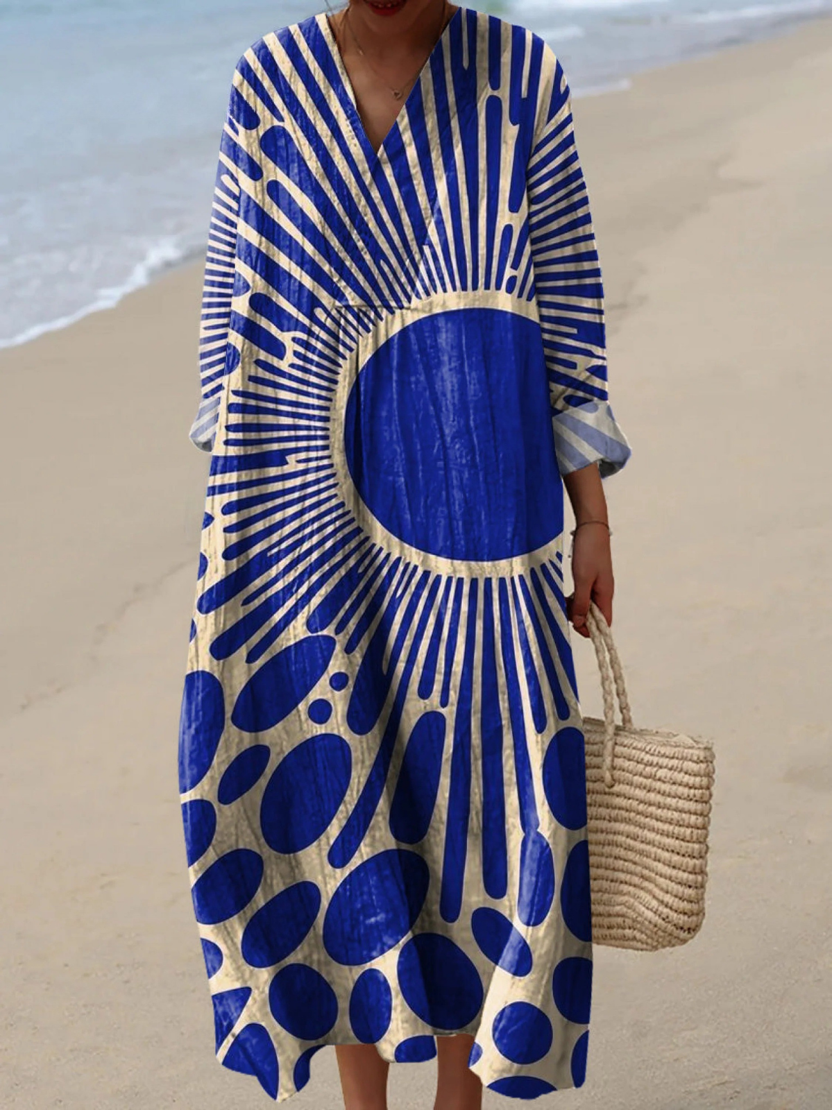 Boho maxi dress with blue and white spiral pattern, V-neck and tiered sleeves