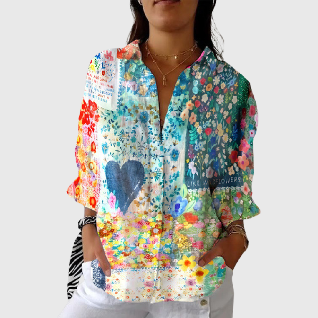Blusa leggera multicolore a fiori con scollo a V e maniche a tre quarti