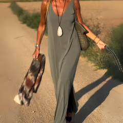 Abito maxi boho senza maniche blu con scollo a V, spacchi laterali e tessuto fluido