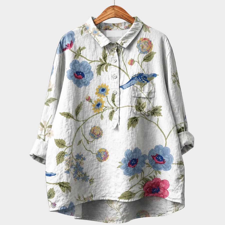 Blusa estiva in lino bianco con stampa floreale colorata, bottoni e colletto