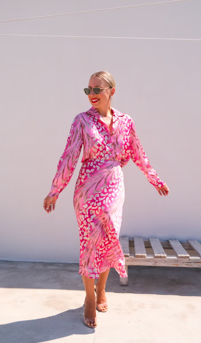 Pink and cream patterned long-sleeve midi dress with V-neck and tie waist