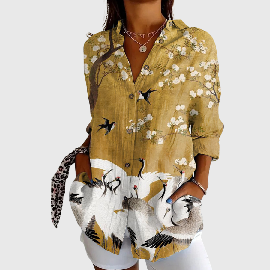 Blusa leggera colorata con stampa di uccelli e fiori, maniche lunghe, bottoni