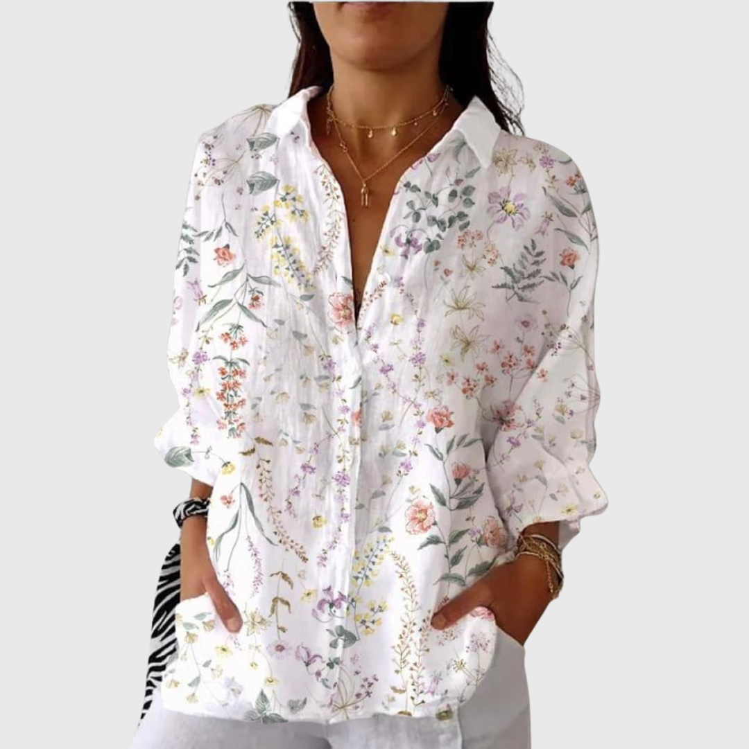 Blusa leggera bianca a fiori con bottoni e maniche lunghe