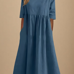 Abito classico azzurro/blu con maniche corte e vita arricciata, gonna svasata
