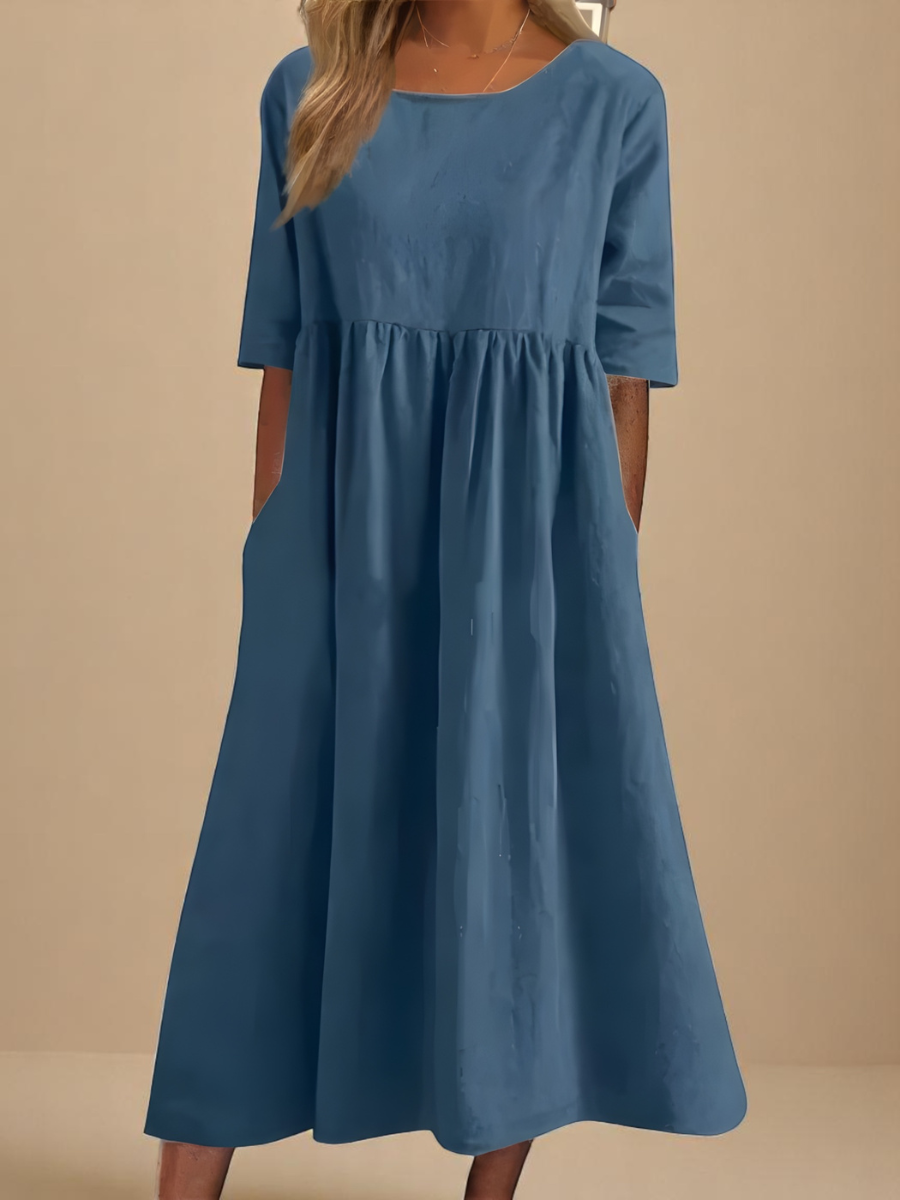 Abito classico azzurro/blu con maniche corte e vita arricciata, gonna svasata