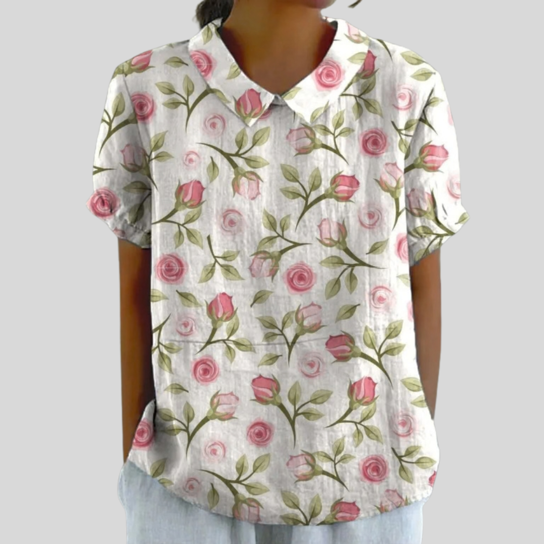 Top a maniche corte con colletto e scollo a V, stampa floreale rosa e foglie verdi