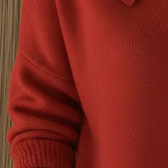 Women’s red button-collar cardigan with long sleeves and ribbed cuff detail