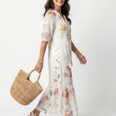White floral tiered midi dress with V-neck and gathered tiered skirt