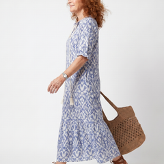 Blue printed midi dress, V-neck with tassel tie, side view