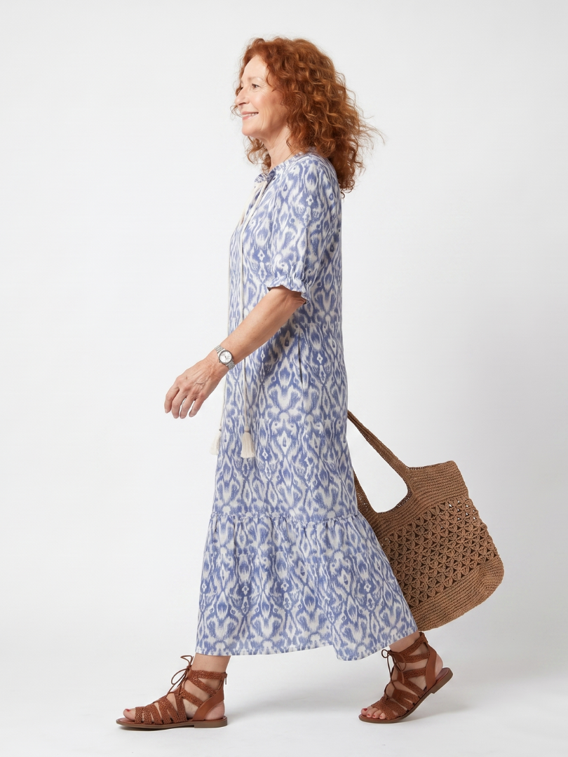 Blue printed midi dress, V-neck with tassel tie, side view