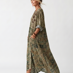 Green button-front embroidered midi dress, side view, short sleeves, oversized pockets