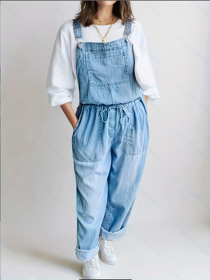 Blue denim relaxed wide-leg overalls with adjustable straps and front bib pocket