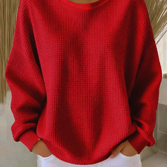 NYLA classic sweater in red waffle-knit, crewneck, long sleeves with ribbed cuffs.