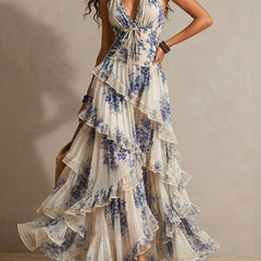 Blue and white floral halter maxi dress with tiered ruffle layers and drawstring waist