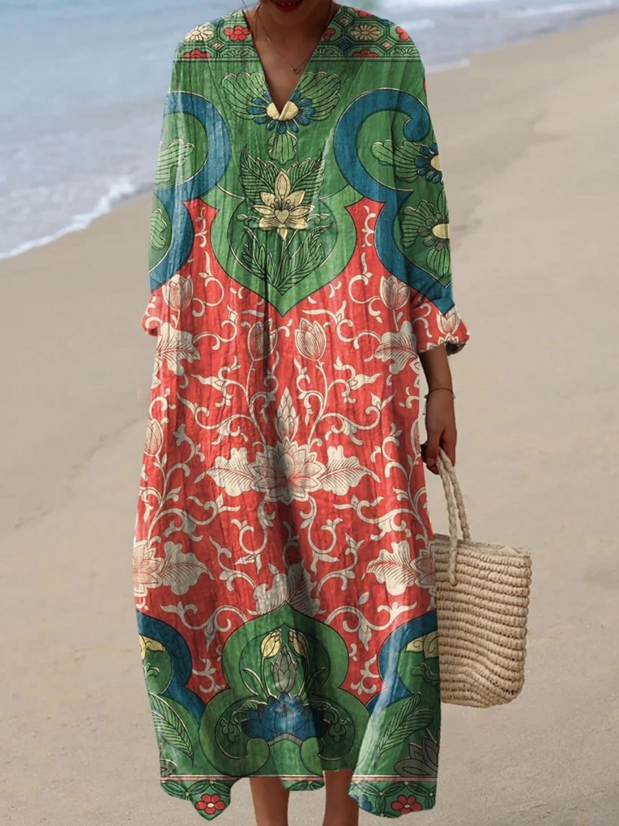 Boho maxi dress with V-neck, long sleeves, and colorful floral paisley print