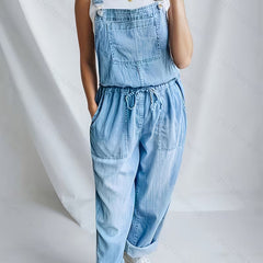 Blue denim relaxed wide-leg overalls with drawstring waist and bib front pocket
