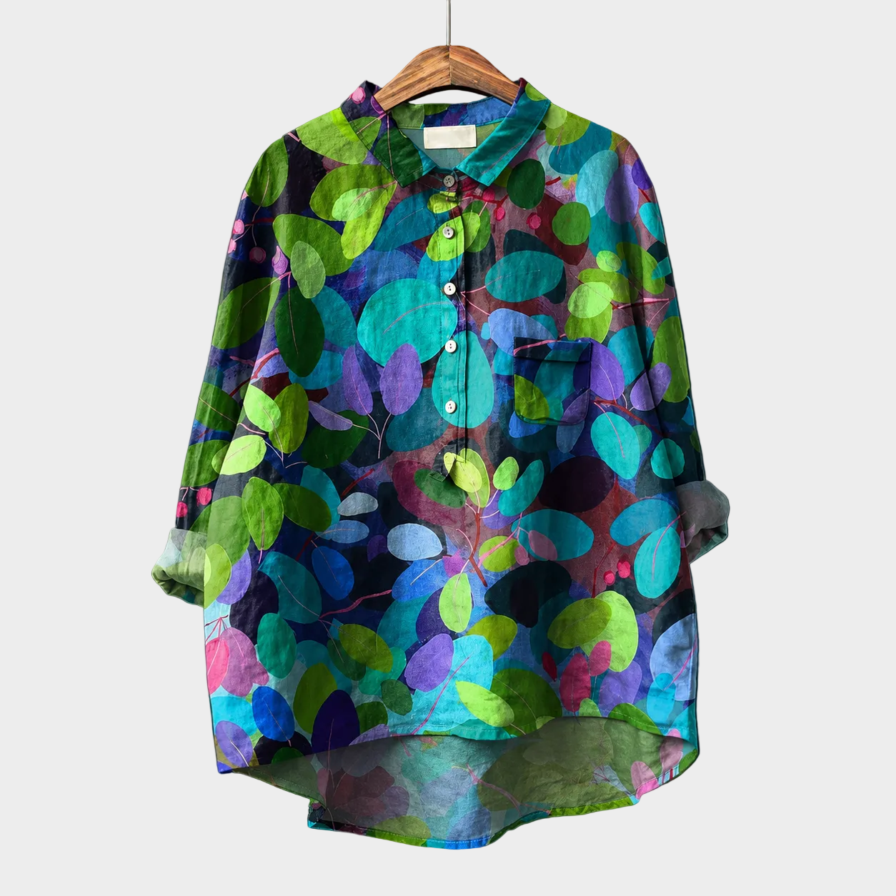 Blusa estiva elegante a maniche lunghe con colletto, bottoni e tasca, fantasia multicolore