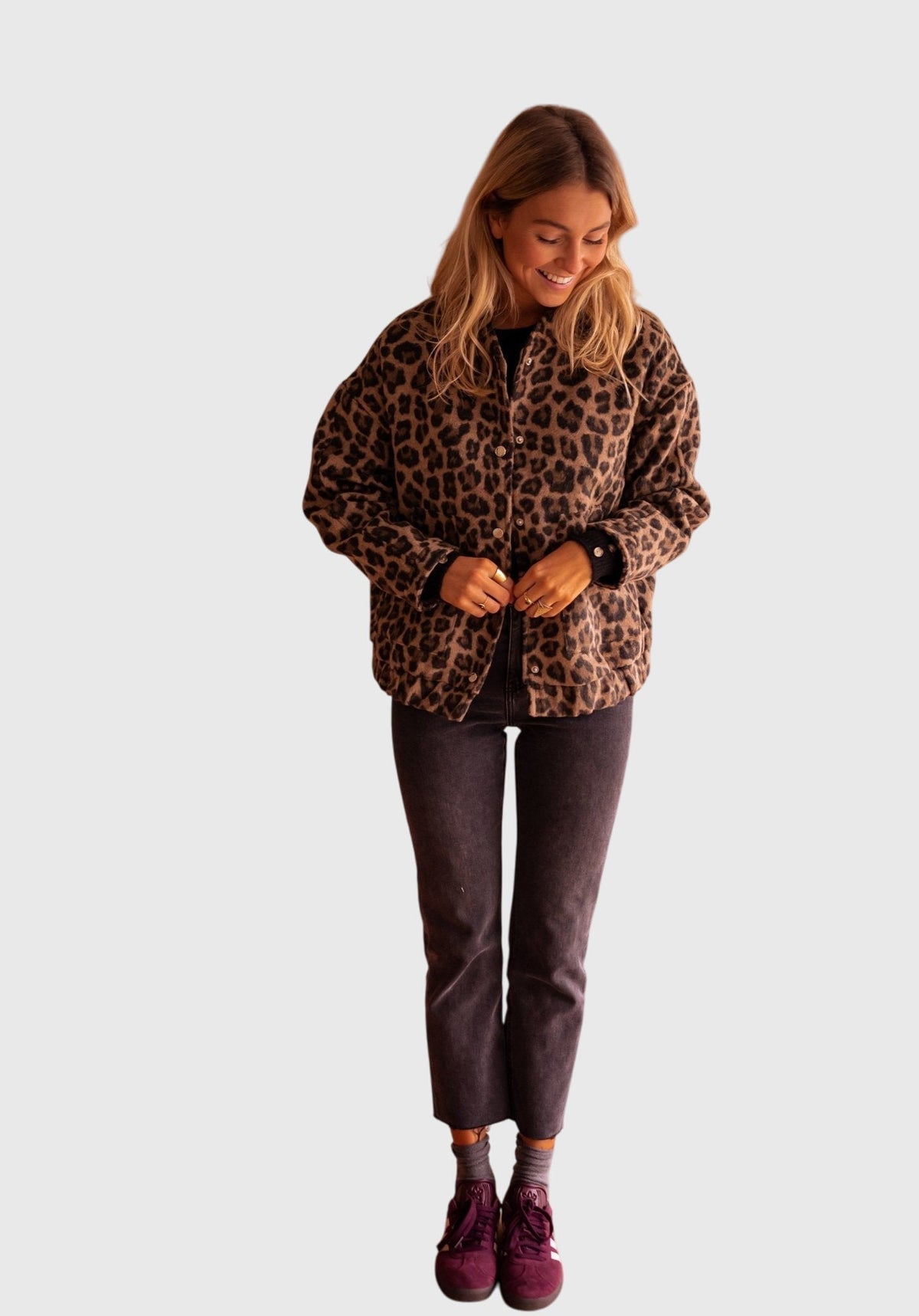 Leopard print button-up jacket with long sleeves and chest pockets