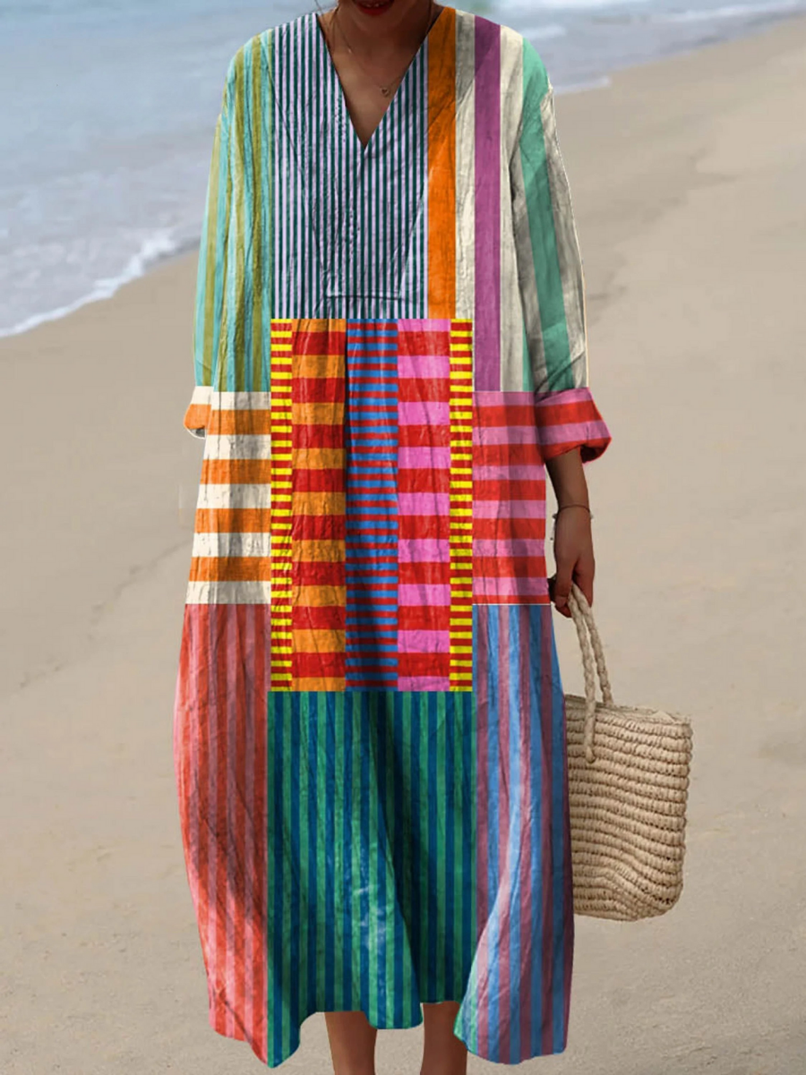 Boho maxi dress with V-neck, long sleeves, and multicolor vertical stripe pattern