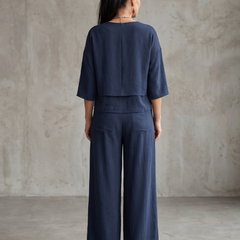 Navy layered top and wide-leg pants set, back view