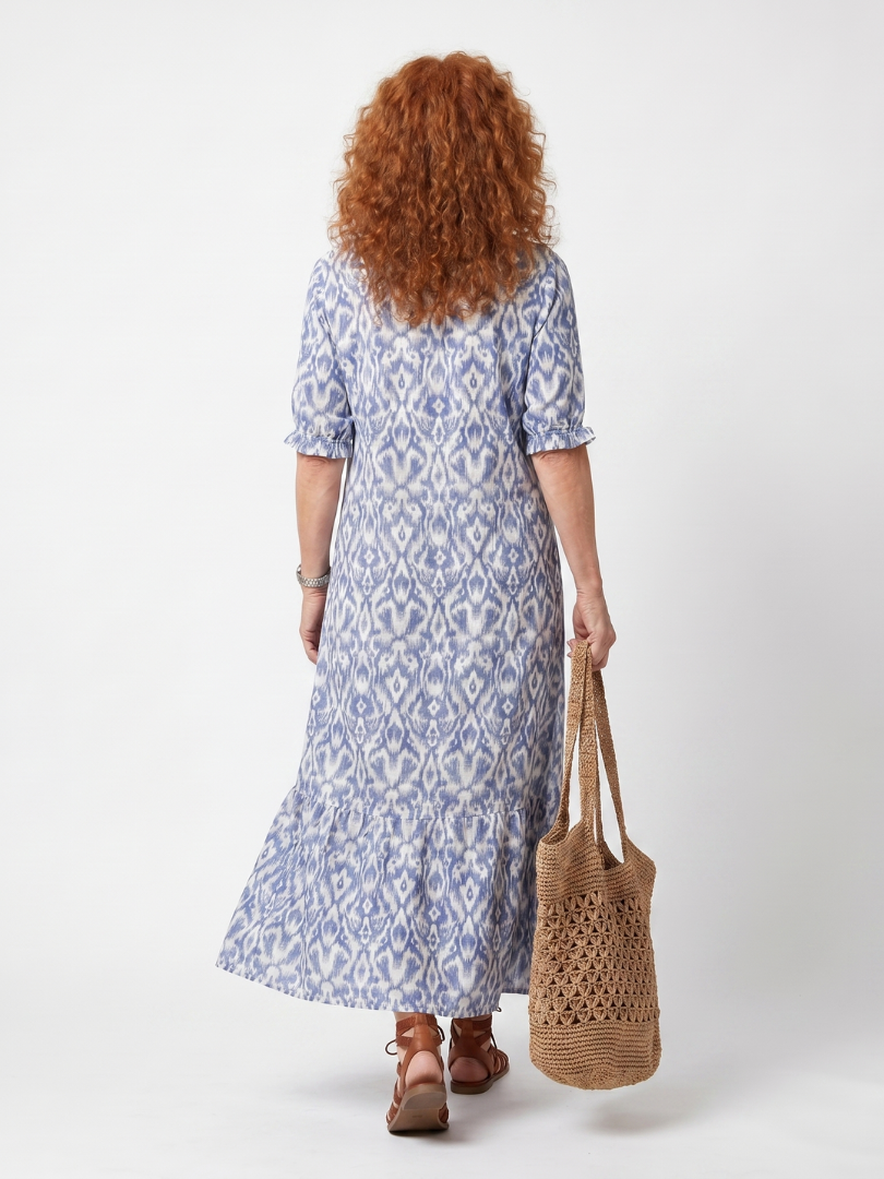 Blue printed midi dress with short sleeves and back tie detail, back view