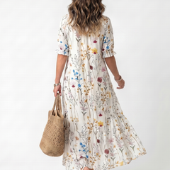 Botanical print midi dress with tassel tie, short sleeves, V-back, gathered flared hem
