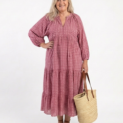 Geometric print dusty rose long-sleeve midi dress with buttoned V-neck and pockets
