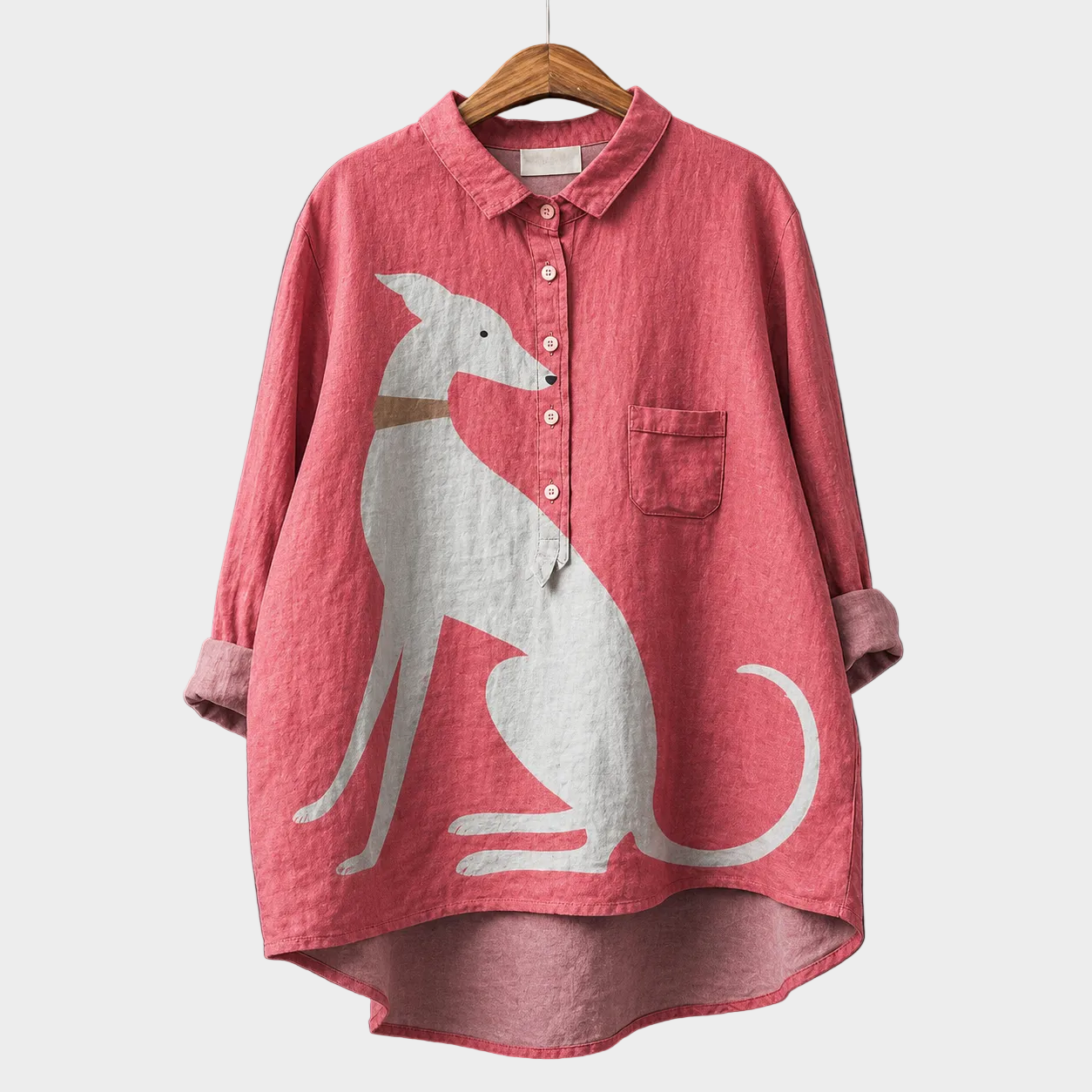 Blusa estiva elegante rosa con bottoni e tasca, stampa grande bianca.