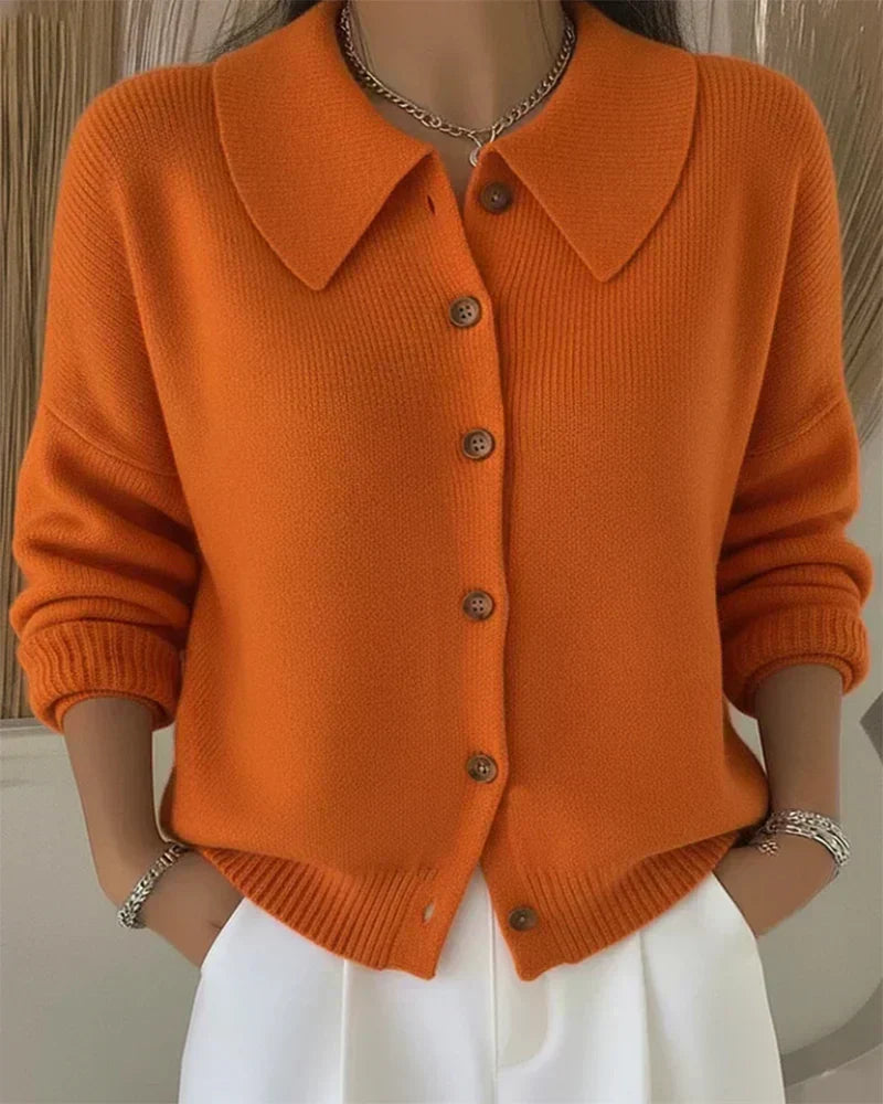 Women’s orange button-collar cardigan sweater with front buttons and ribbed cuffs
