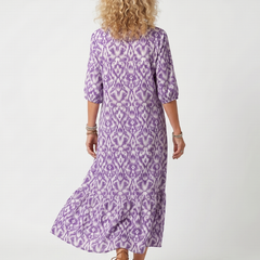 Purple printed midi dress with V-neck, tassel tie, back view, three-quarter sleeves