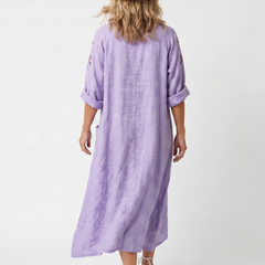 Purple oversized midi dress back view, relaxed fit with elbow sleeves and mid-calf length