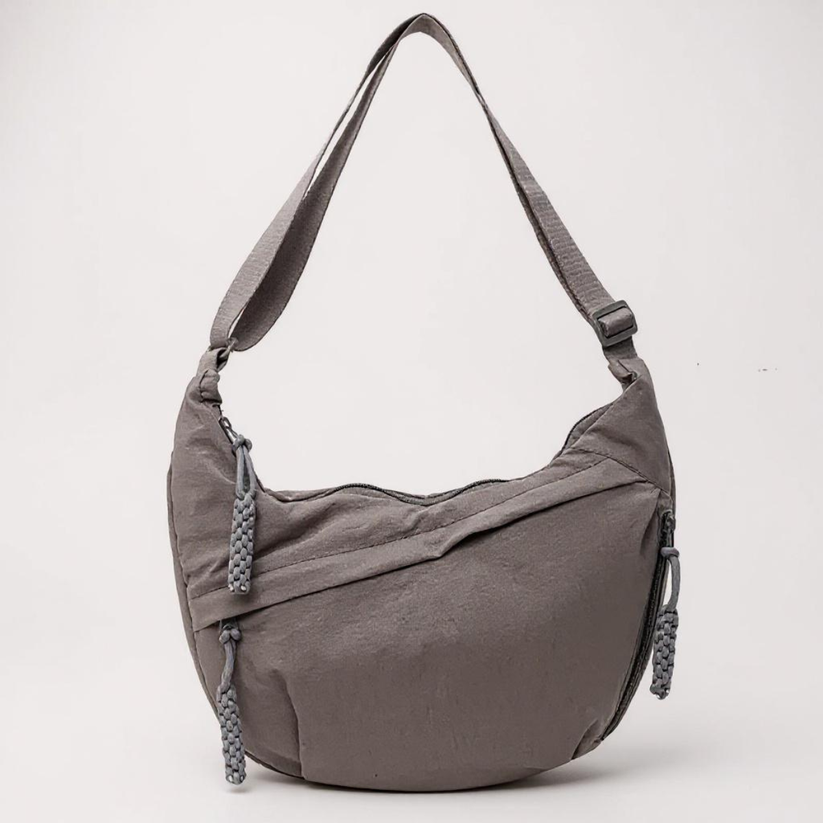 Borsa a tracolla grigia in tessuto con zip laterale e tracolla regolabile