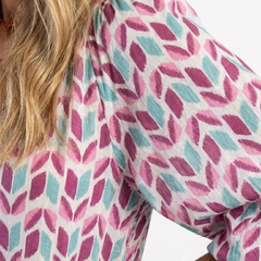 Geometric print dress top with V-neck and puff sleeve detail, lilac and teal
