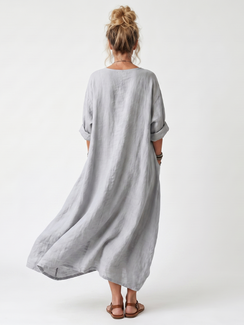 Women's midi dress with three-quarter sleeves and flowing gray back, roomy fit