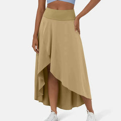 Asymmetric midi skirt in beige with high-low hem and draped side panel