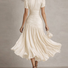 White striped satin midi dress from back, short sleeves and gathered waist with flared pleats.