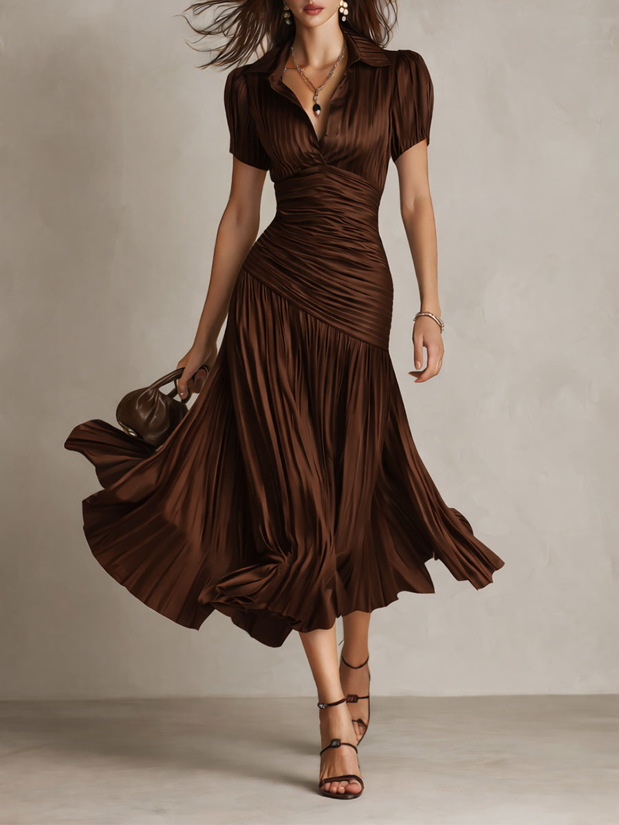 Brown striped satin midi dress with V-neck, gathered ruched bodice, short sleeves, flared pleats.