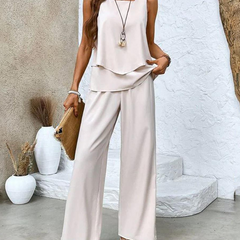 Completo estivo bianco: top senza maniche a balze e pantaloni palazzo