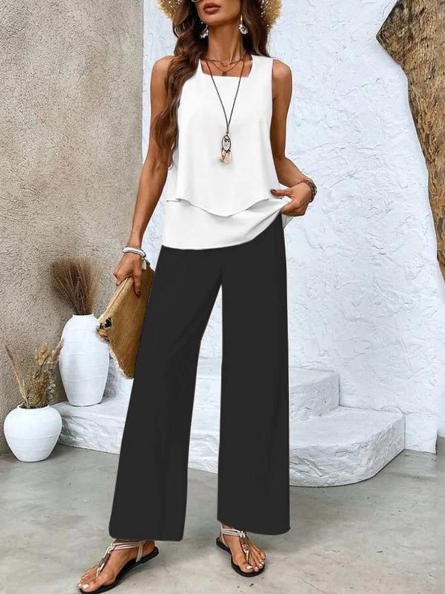 Completo estivo nero: top a balze senza maniche e pantaloni palazzo ampi