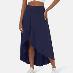 Asymmetric midi skirt in navy with high-low hem and draped side panel