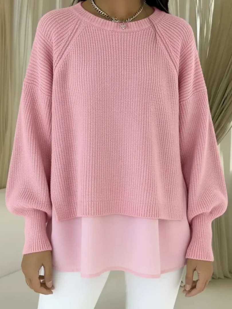 Pink layered-look sweater with ribbed knit and wide sleeves
