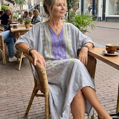 Women's midi dress with purple V-neck panel, floral embroidery and oversized front pockets